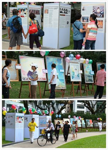 民众阅读真相展板，或索要真相资料，观看法轮功学员创作的油画作品