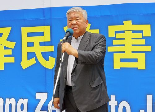 图14：图为首尔朝鲜族教会牧师徐京锡演讲。