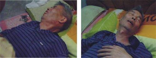 '谢德清被迫害得心中绞痛难忍，满脸痛苦。'